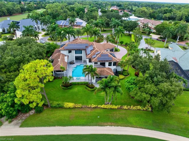 .88 Acres of lush landscaping surrounds this home