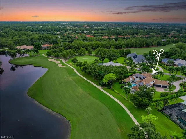 Backyard with amazing views of the lake and 5th green of the Creek Course