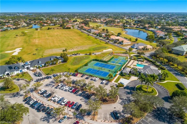 Aerial perspective featuring a large body of water and a golf course