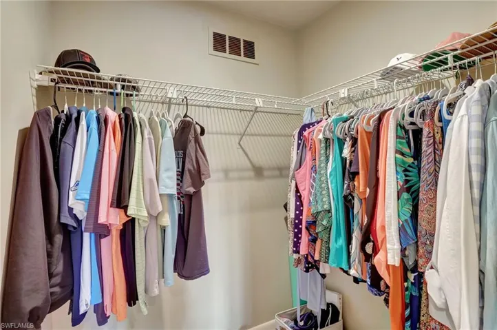 View of spacious walk in closet in the main bedroom