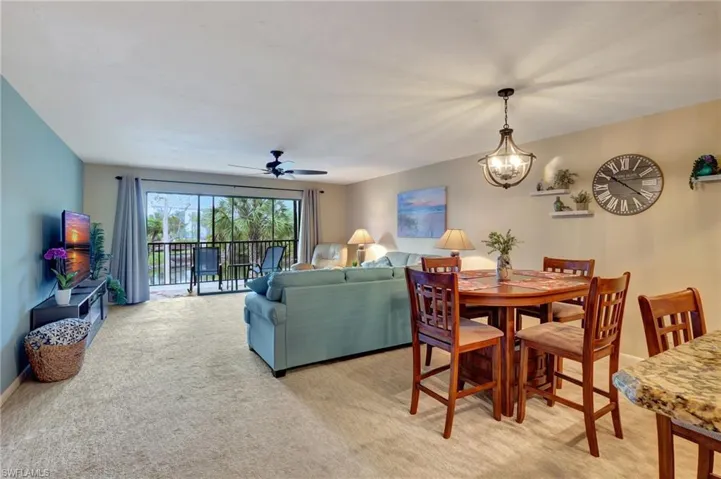 Open dining space featuring chandelier