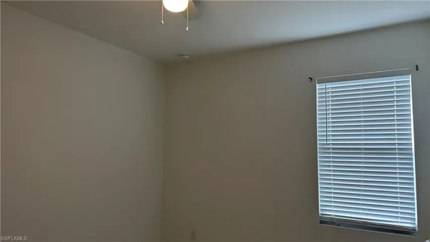 Unfurnished room with ceiling fan