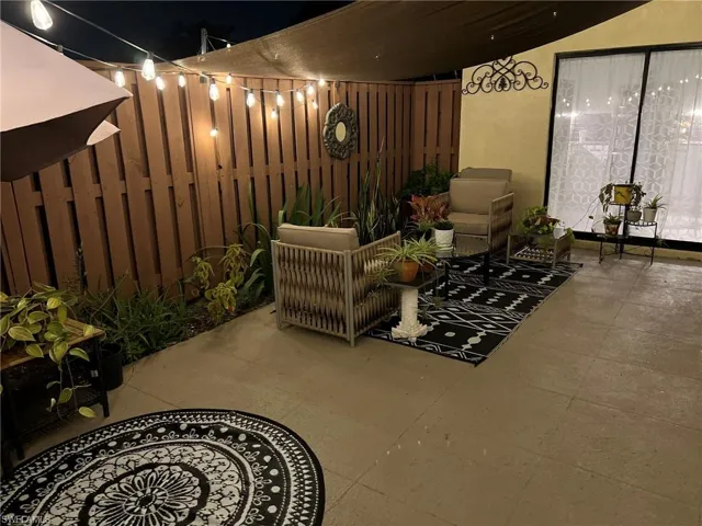 Patio at twilight featuring a patio