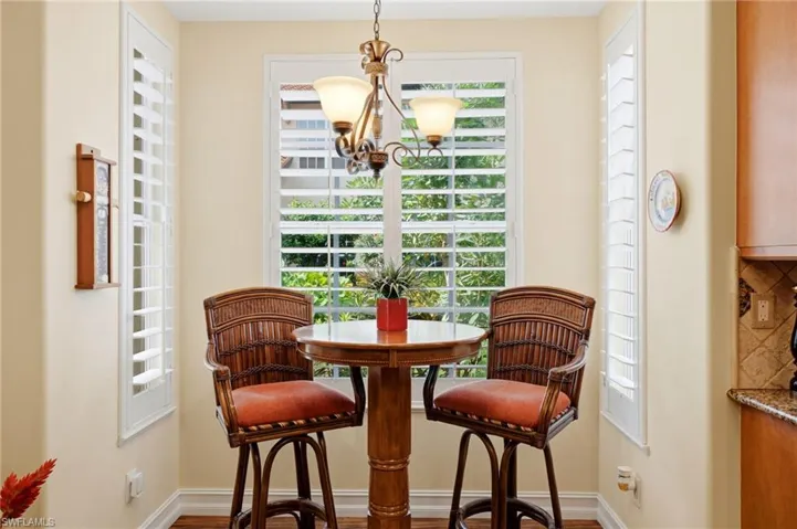 Cozy breakfast nook tucked within the kitchen area.