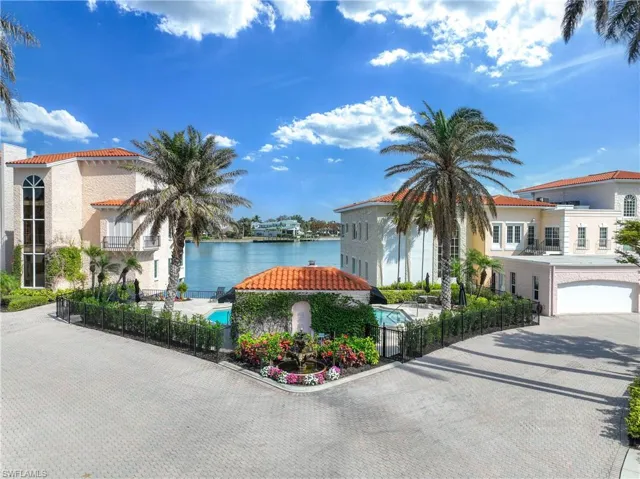 Venetian Villas inside entry near community pool, with view of Doctors Bay