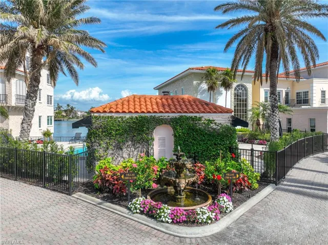 Venetian Villas inside entry near community pool, with view of Doctors Bay