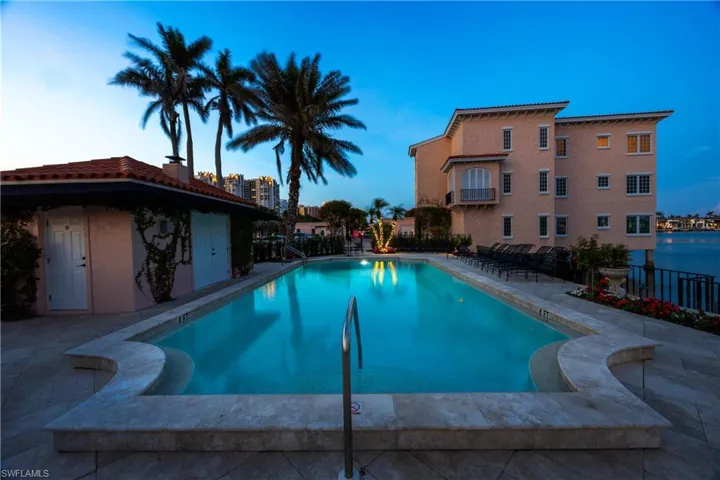 Venetian Villas community pool at twilight