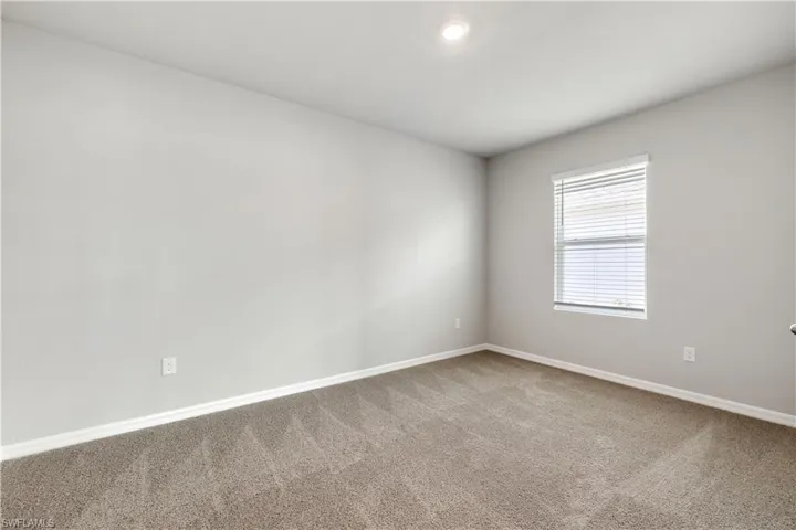 Unfurnished room featuring carpet floors