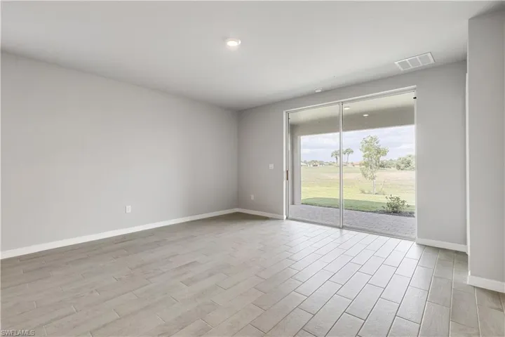 Unfurnished room featuring light wood-type flooring