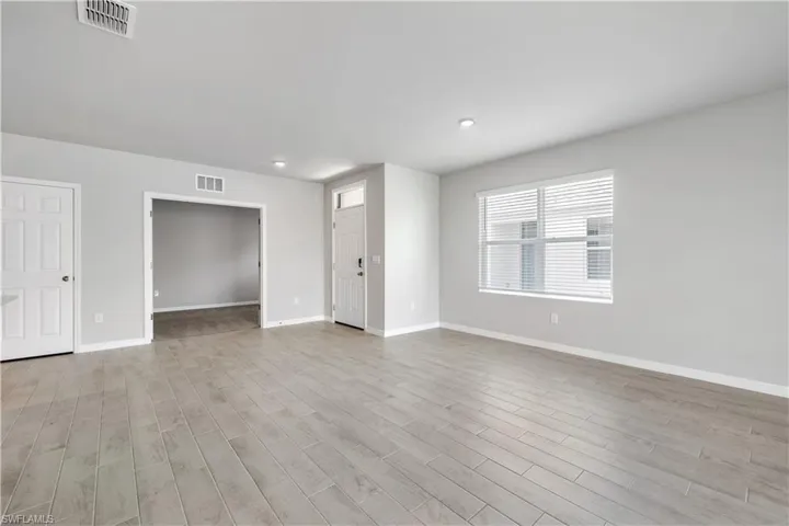Unfurnished room featuring light hardwood / wood-style floors