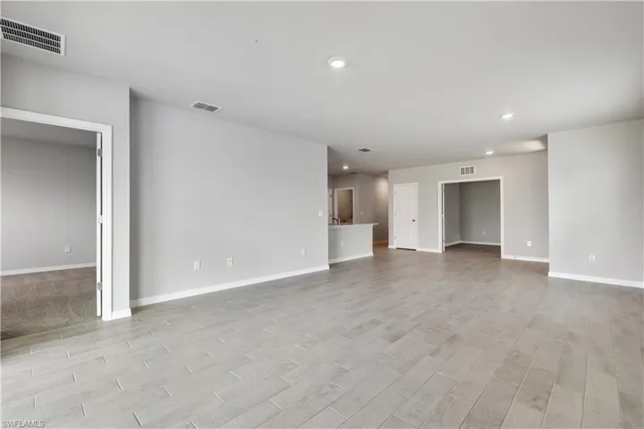 Spare room featuring light hardwood / wood-style floors