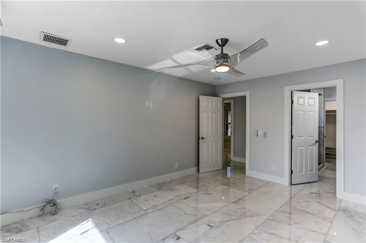 Primary Bedroom with large closet and en suite bathroom. Another large suite could be made upstairs in the additional room. approx. 400 SF