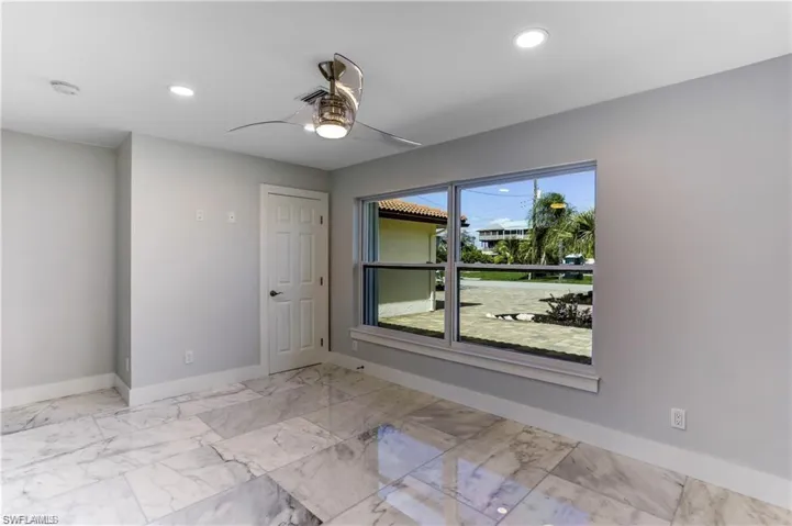Front guest bedroom with large picture window.