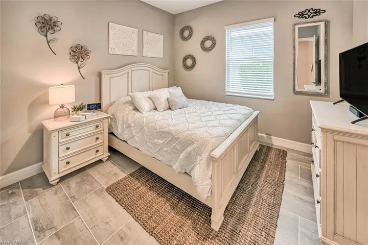 Bedroom with baseboards