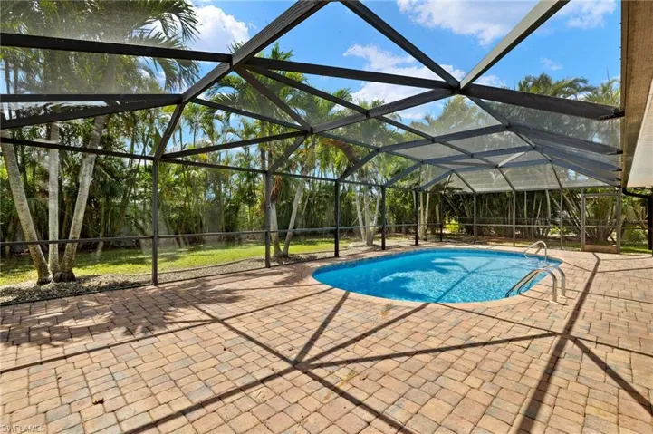 Outdoor HEATED pool with so much outdoor living space