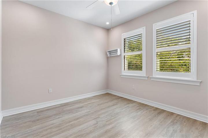 4th bedroom has plantation shutters.