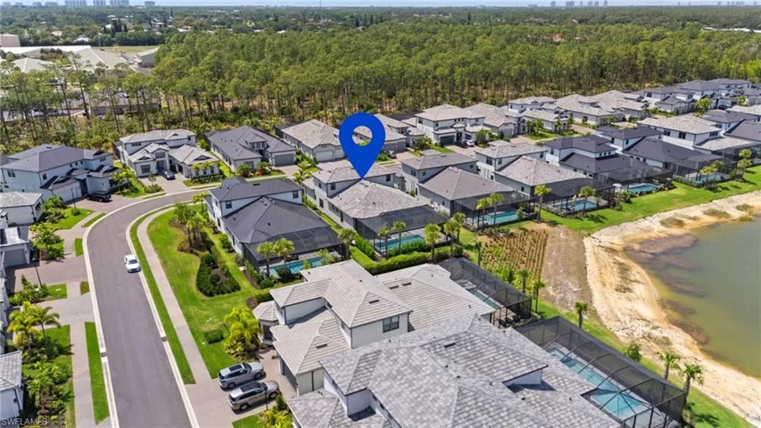 Aerial view with a residential view and a water view