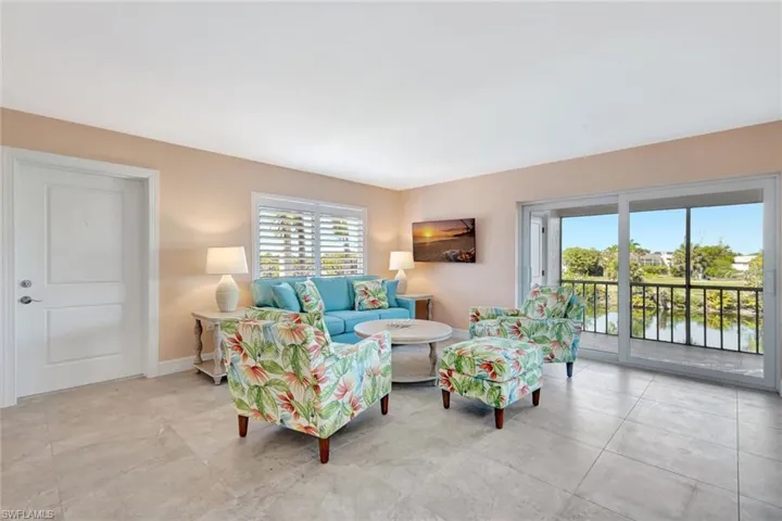 Living area featuring baseboards