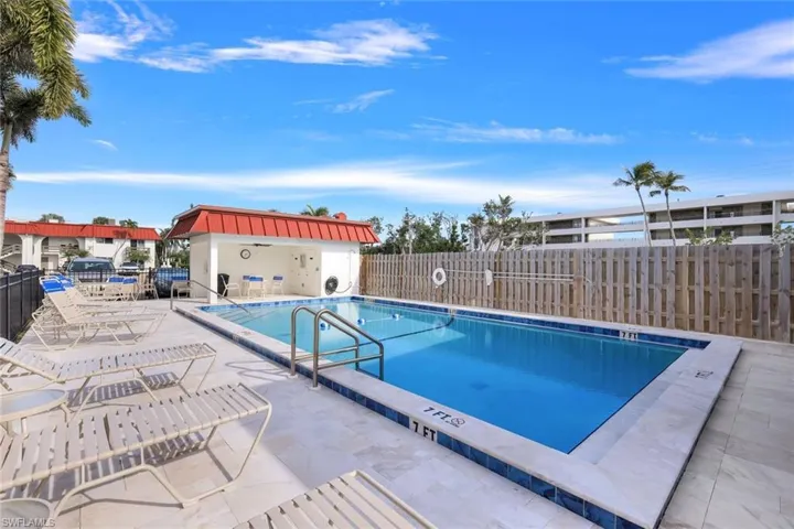 Community pool featuring a patio area
