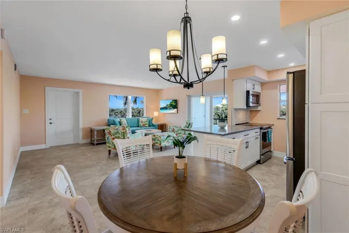 Dining area with a chandelier
