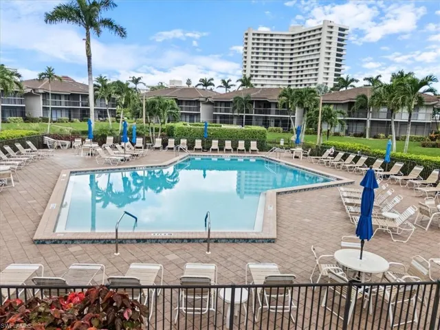 Community pool featuring a patio area