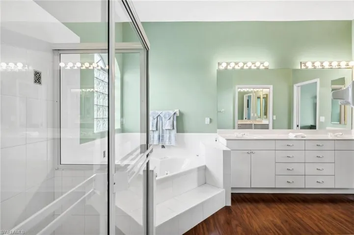 Master Bath with Separate Jacuzzi Bath and Shower