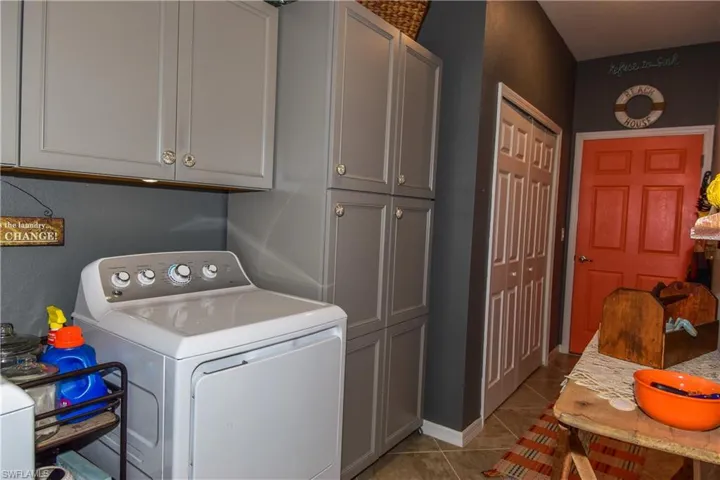 Your large laundry room offers plenty of additonal storage