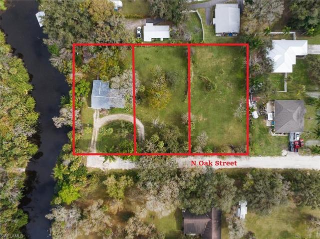 Aerial view showing the approx. property boundaries for all three parcels.