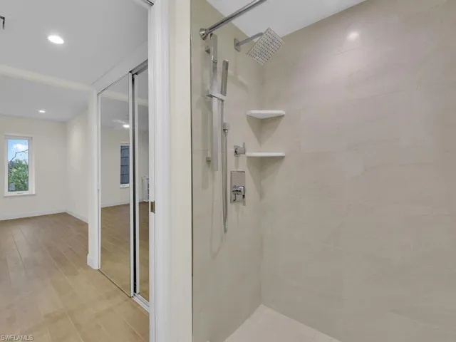 Bathroom with a tile shower