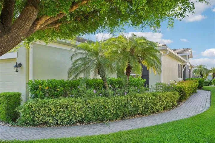 View of property exterior with a garage