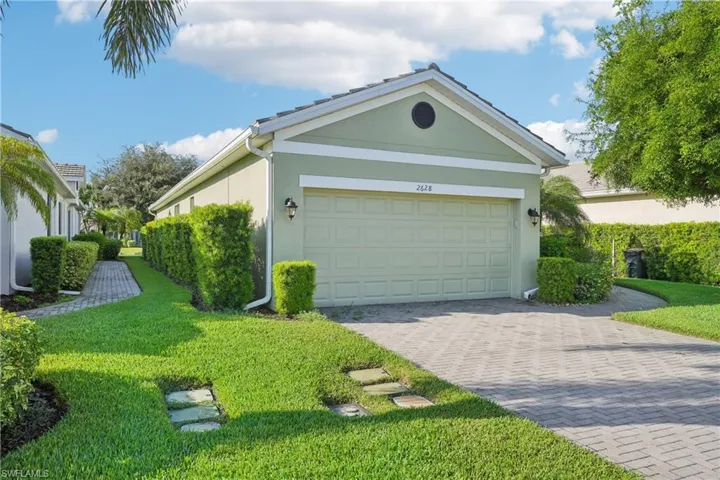 Garage with a lawn