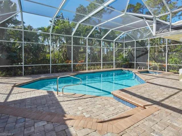 The preserve area surrounding this home is lush and tropical!