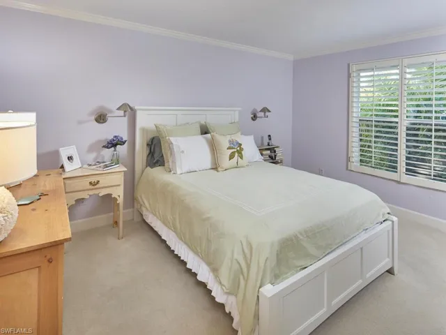 Guest bedroom privately tucked away from the primary suite.