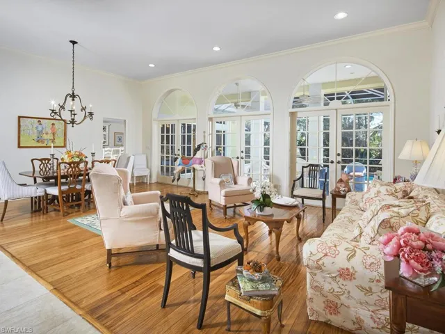 Entertain with ease; the kitchen is accessible through the doorway to the left and there is plenty of seating for pre-dinner drinks.
