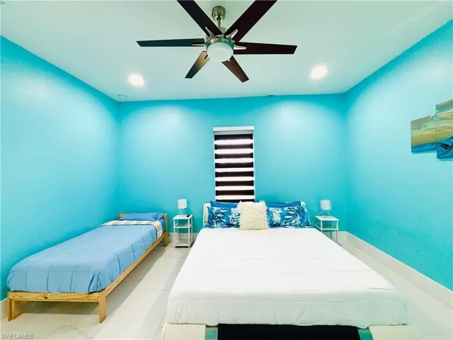 Bedroom featuring ceiling fan