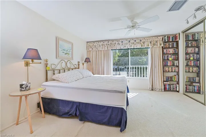 Bedroom featuring carpet floors and a ceiling fan