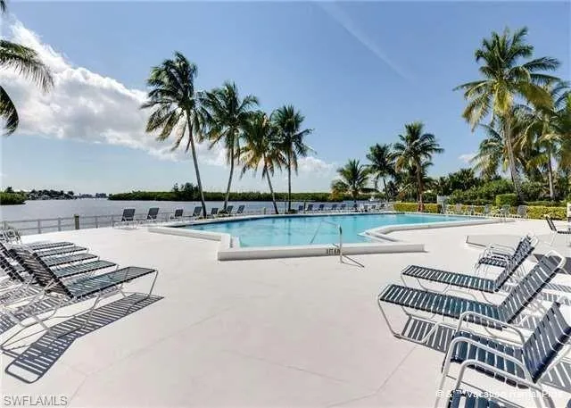 Community pool featuring a patio area