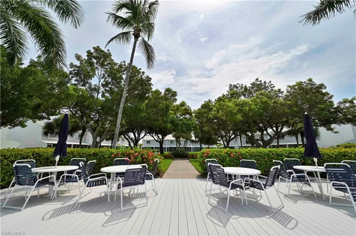 Wooden terrace with outdoor dining area