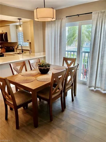 Dining room with light wood-style flooring