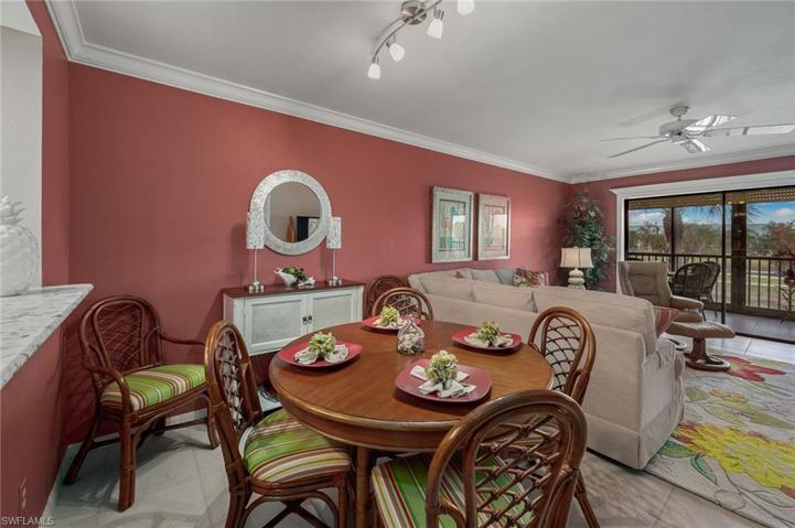 Dining/living area with crown molding