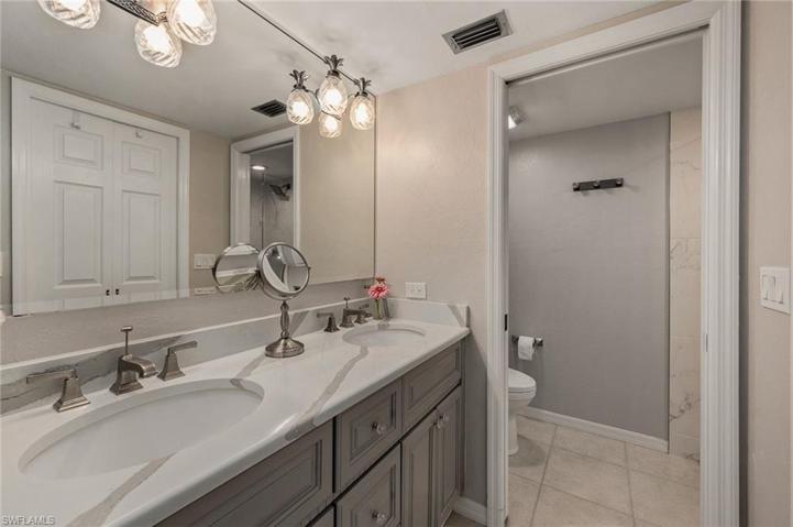 Updated master bath vanity with double sinks