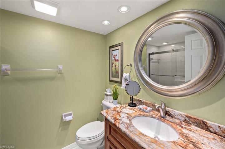 Updated guest bath with glass doors