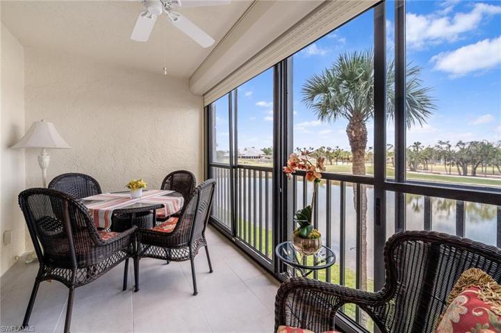 Large lanai overlooking lake and 14th tee