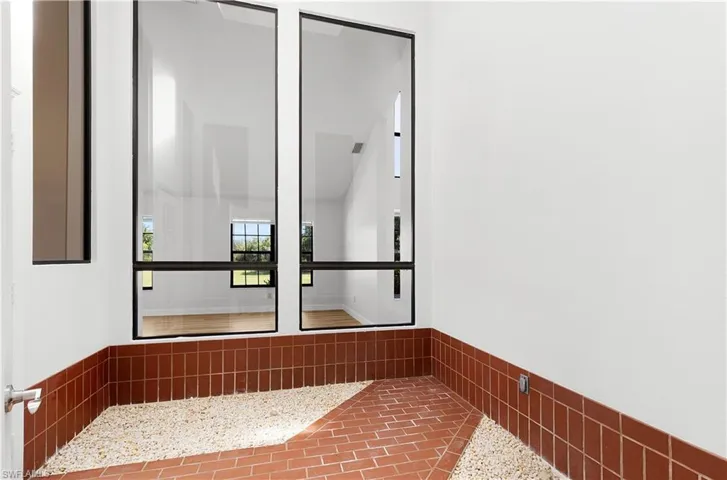 Bathroom with vaulted ceiling