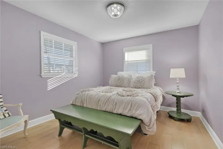 Bedroom featuring baseboards and light wood-style flooring