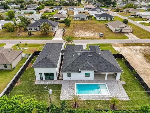Aerial view of residential area with a pool area