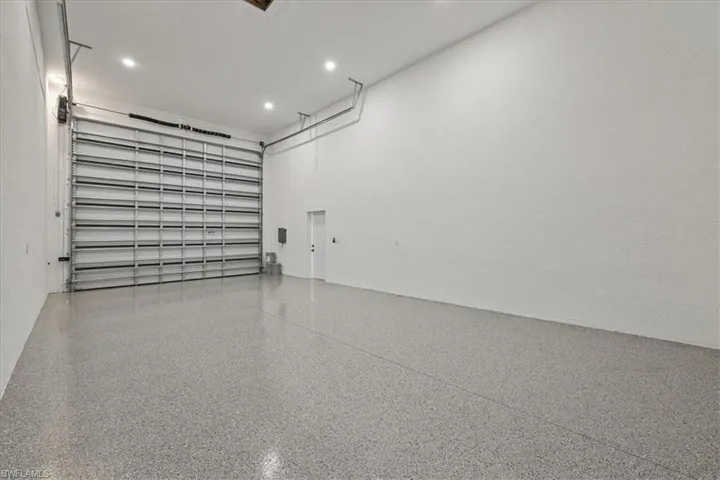 Garage featuring recessed lighting