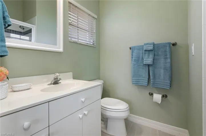 Ensuite Bathroom with vanity and toilet