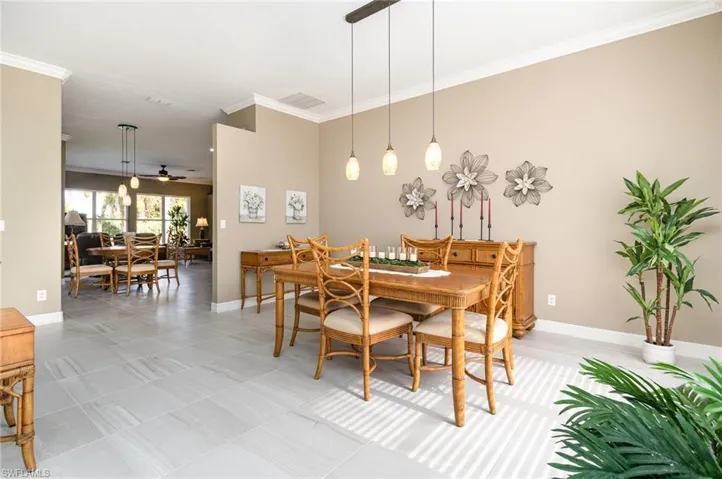 Dining room featuring crown molding