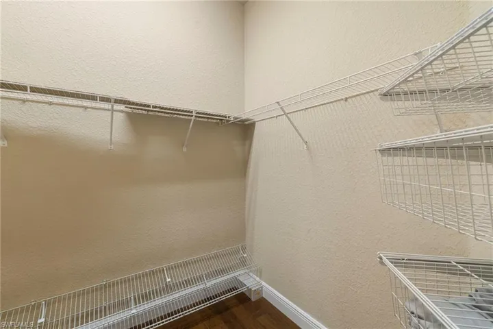 Two Spacious closets  his one side of the hallway and hers on the other side of the hallway closet with hard wood finished floors a wonderful addition to the home.
